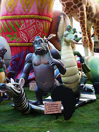 gorilla and crocodile step on zebra