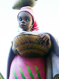 black woman carrying basket