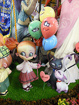Cats and girl with balloons
