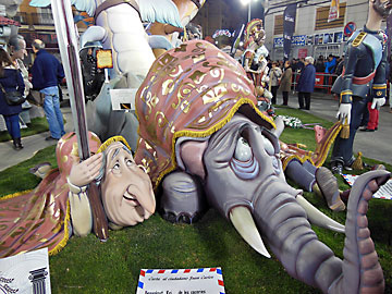 Juan Carlos I and elephant under the carpet