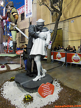 sailor kissing girl